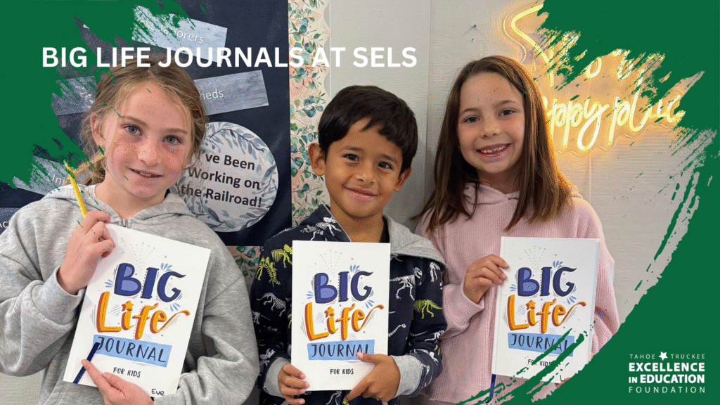 SELS Students holding their Big Life Jouranls