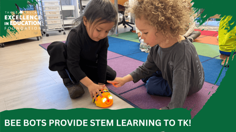 TK students at Truckee Elementary play with a Bee-Bot robot